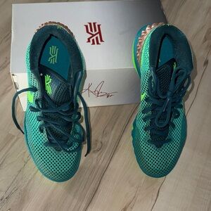 Kyrie 1 Australia Teal and Green Strike Radiant Emerald Metallic Sneakers